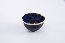 Load image into Gallery viewer, Small blue bowl with gold-tone rims, perfect for condiments or snacks. Can be paired with a larger bowl for dressing or dip. Food, dishwasher, and oven safe. Tarnish and stain-free. Easy to care for.

