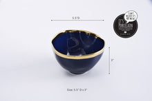 Load image into Gallery viewer, Elegant small bowl in blue porcelain with gold-tone rims, great for condiments or snacks. Food safe, dishwasher safe, oven safe to 500°.
