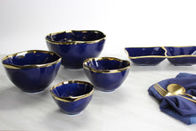 Load image into Gallery viewer, Small blue porcelain bowl with gold-tone rims, perfect for condiments or snacks. Food safe, dishwasher safe, oven safe to 500°. Easy Care.
