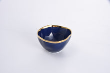 Load image into Gallery viewer, Snack Bowl in Sunset By The Sea: Blue glazed porcelain with gold-tone rims. Ideal for nuts, berries, candies, and dip. Versatile for individual snacking or taco night toppings.
