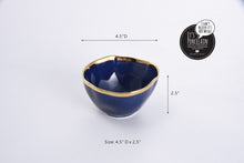 Load image into Gallery viewer, Blue glazed porcelain snack bowl with gold-tone rims. Ideal for nuts, berries, candies, and dip. Food safe, dishwasher safe, oven safe to 500°. Easy to care for.
