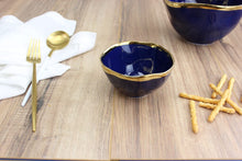Load image into Gallery viewer, Snack bowl in luxurious blue glazed porcelain with gold-tone rims. Perfect for nuts, berries, candies, and dip. Food safe, dishwasher safe, oven safe to 500°.
