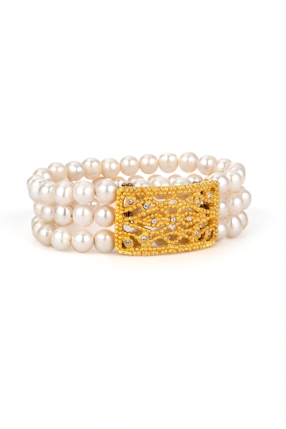 Elegant bracelet with three strands of white Freshwater Pearls and an Austrian Crystal Boucle pendant, perfect for layering.