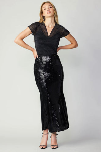 A stylish black sequin skirt that adds a touch of sparkle to any outfit.