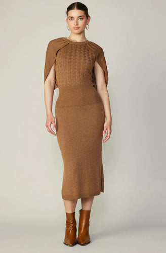 A cozy brown midi sweater dress, perfect for chilly days and stylish outings. Stay warm and fashionable!