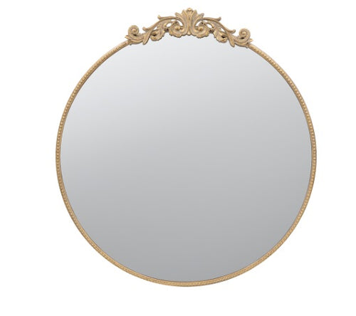 Vintage-inspired round mirror with ornate adornments on top for a classic touch.
