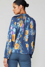 Load image into Gallery viewer, A lovely blue top featuring delicate floral patterns.
