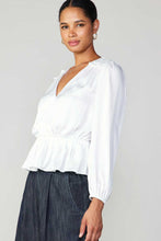 Load image into Gallery viewer, A chic white blouse with a V-neck and long sleeves.
