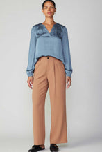 Load image into Gallery viewer, These polished pleated wide-leg pants offer both style and comfort. The neutral shade and partially elasticized waistband ensure a precise fit. Finished with slant front and welt back pockets.
