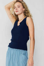 Load image into Gallery viewer, Woman in a navy blue skirt and top, styled in a sophisticated Sleeveless V-neck Sweater Top from Current Air.
