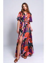 Load image into Gallery viewer, A model showcases a Hutch Layton Dress, a vibrant floral print Maxi Shirt Dress with kimono-style sleeves and button-down design.
