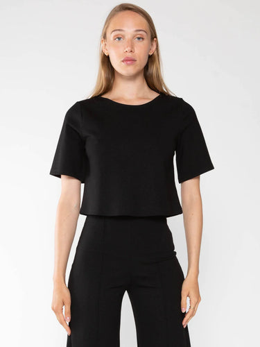 The Ponte Knit Short Sleeve Top by Ripley Rader, creates a chic silhouette with a comfortable feel.
