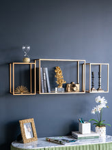 Load image into Gallery viewer, Enhance your home or office with this set of 6 floating wall shelves featuring a gold frame, varied designs, iron, and veneer accents.
