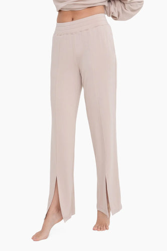 Tan lounge pants with stylish slits for a trendy and comfortable look