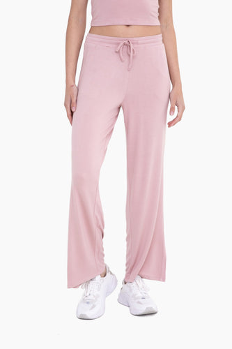 Comfy pink lounge pants with a relaxed fit and elastic waistband