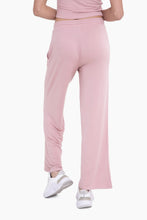 Load image into Gallery viewer,  Stay cozy in these pink lounge pants featuring a loose fit and drawstring waist.
