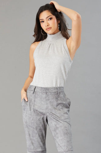 Knit halter top, perfect for dressing up with work pants or down with jeans. Versatile outfit for lunch or dinner.