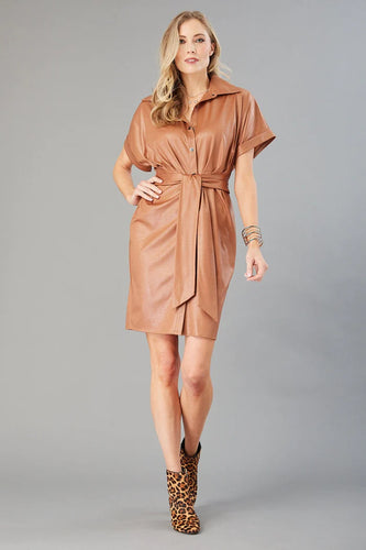 Cognac kimono-style shirt dress in tan leather with attached belt and snap closure.