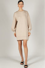Load image into Gallery viewer, Stylish taupe mini dress featuring dropped shoulders, long sleeves, and a round neck, made from durable scuba modal material.
