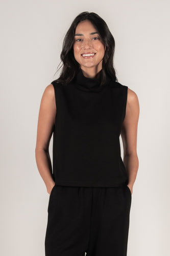 Stylish sleeveless black scuba top with a cowl neck design, offering comfort and a fashionable appearance.