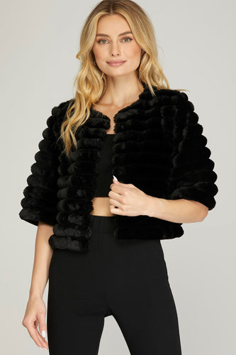Luxurious Rose Faux Fur Jacket with half-sleeves, hitting above waistline. Adds glamor and elegance to any look.