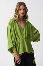 Load image into Gallery viewer, A hammered satin top featuring three-quarter kimono sleeves, a V-neckline, and pleats, showcasing elegant peplum style.
