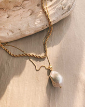 Load image into Gallery viewer, Striking large baroque pearl necklace with unique shape, polished by years underwater. Sophisticated and elegant, perfect for solo wear or layered with chains and pendants. AAAA quality.
