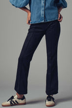 Load image into Gallery viewer, Black faux suede flare mid rise pants.
