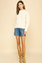 Load image into Gallery viewer, Woman wearing a white sweater, denim shorts, and tan boots on a beige background
