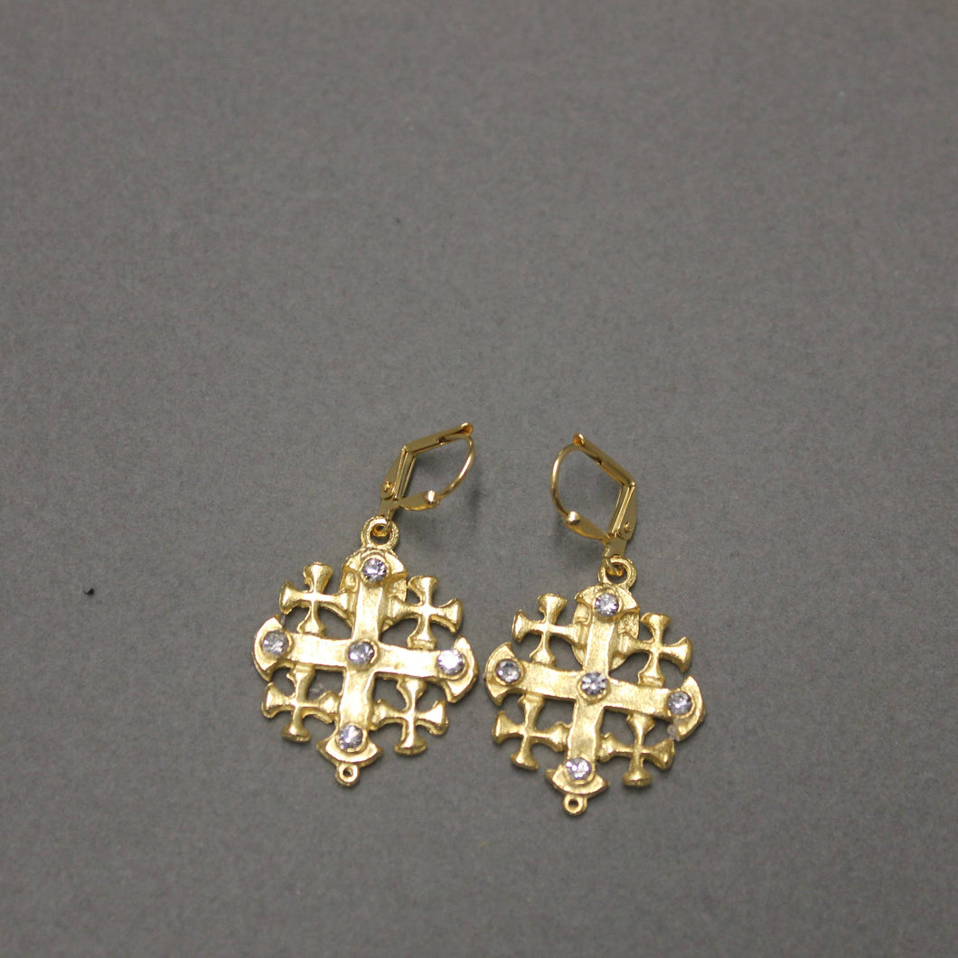 Gold cross-shaped dangle earrings with cubic zirconia gems.