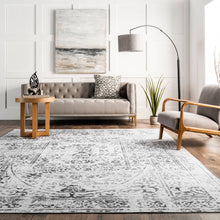 Load image into Gallery viewer, A modern, neutral-colored rug on a gray background; perfect for transitional or vintage style décor. Made of 100% polyester, machine-made in China.
