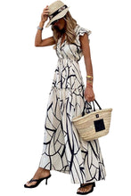 Load image into Gallery viewer,  A vibrant abstract print maxi dress that&#39;s perfect for any occasion.
