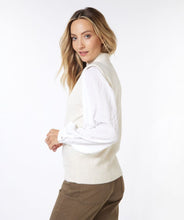 Load image into Gallery viewer, Soft and light, this sleeveless beige knit top exudes elegance and charm. With its comfortable fit and contemporary design, it effortlessly adds sophistication to any ensemble.
