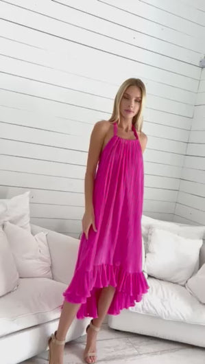 Hilma Dress Pink Plisse by Julian Chang: Fun and flirty A-line dress in playful pink plisse fabric, perfect for any occasion.