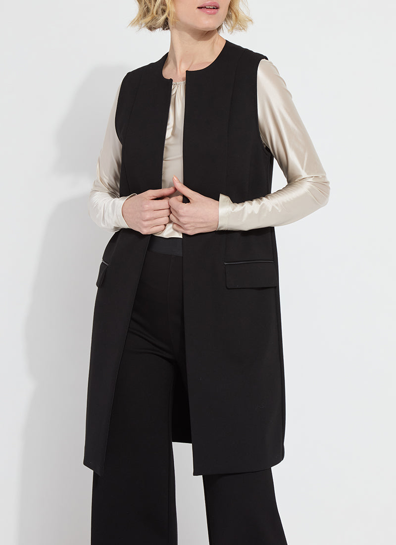 Stylish combination featuring a black Denver Ponte Sleeveless Coat, white shirt, and black pants by Lysse.