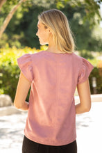 Load image into Gallery viewer, Make a statement with our bold V-neck pink top, made from a cotton blend and adorned with ruffled sleeves.
