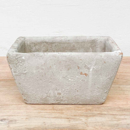 Stockholm Planter in Antique Cream: A vintage-inspired cream-colored planter from Stockholm.