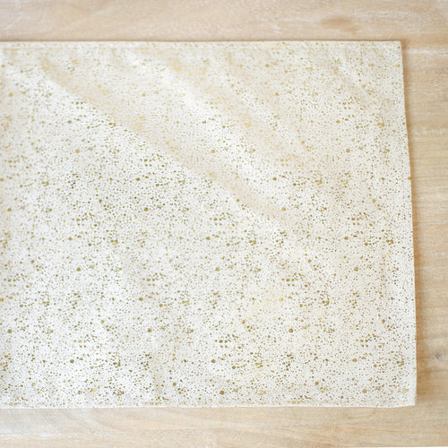 Metallic speckled table runner, 60 inches long, with natural color.