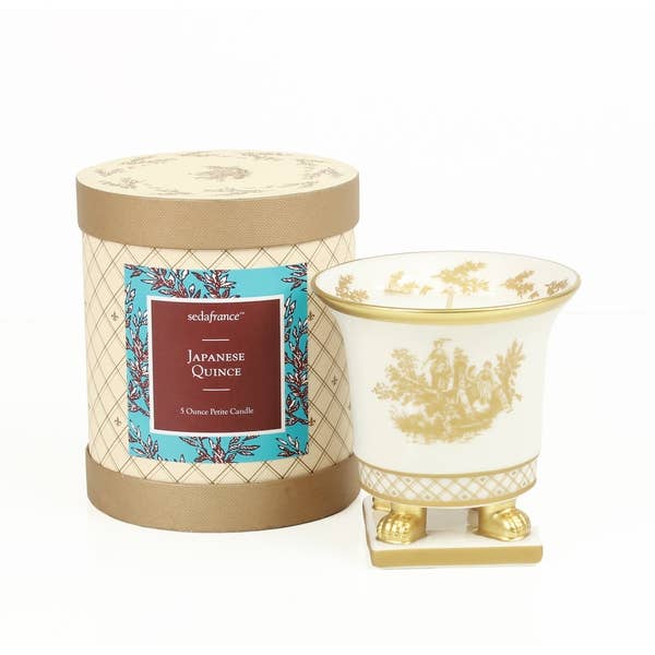 Elegant 5 oz ceramic candles with Japanese quince scent. Features rhubarb, passion fruit, white peach, and white jasmine petals.