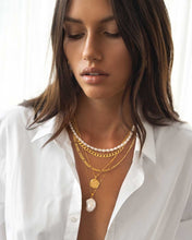 Load image into Gallery viewer, Make a statement with this striking large baroque pearl necklace. Each pearl&#39;s unique shape, polished by years underwater, adds to its elegance. With AAAA quality, it can be worn solo or layered with chains and pendants for a modern and trendy look.
