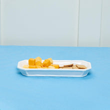 Load image into Gallery viewer, A ceramic dish designed for corn on the cob, but can also be used for appetizers. The white color complements any interior.
