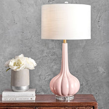 Load image into Gallery viewer, A modern pink table lamp with a white shade, perfect for illuminating any area in your bedroom or living room.
