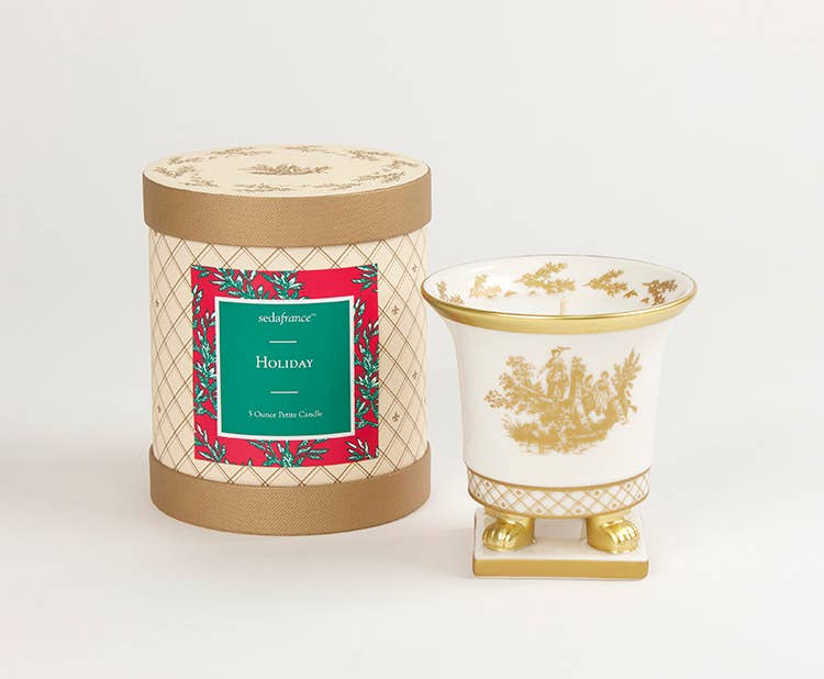 Holiday classic toile petite ceramic candle in a 5 oz. elegant, cylindrical box.