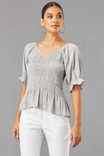 Load image into Gallery viewer, Lola &amp; Sophie&#39;s Smocked V-Neck Top: stylish and versatile with V-neckline and smocked design.
