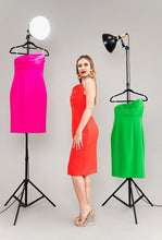 Load image into Gallery viewer, Elegant hot pink cocktail dress with three layers of flowing fabric and intricate detailing, perfect for glamorous events and special occasions.

