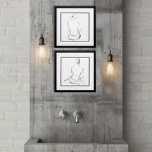Load image into Gallery viewer, Pair of silhouette prints in black frame with double matting and glass. Available for individual purchase or as a set.
