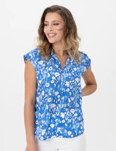 Load image into Gallery viewer, Stylish sleeveless blouse by Renuar with a slight ruffle at the neckline. Made from lightweight and breathable material that flows nicely away from the body. Ideal for work or play during spring or summer.
