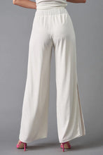 Load image into Gallery viewer, Stay chic in Lola &amp; Sophie&#39;s Eggshell Wide Leg Pant. High waist design for a timeless look. Breathable fabric keeps you cool.
