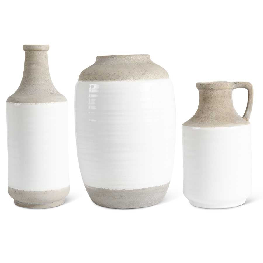 White vases with natural stone design in various sizes and shapes for unique home decor.
