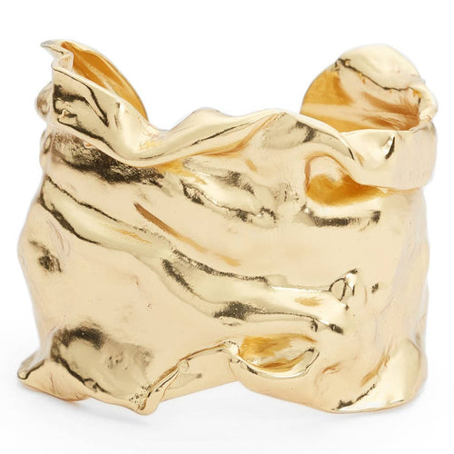  A delicate gold cuff bracelet with intricate wave patterns, resembling crumpled and thin medieval foil, adds a sweet touch to any wrist.